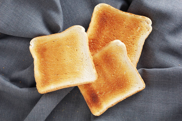 Grillezett pirított kenyér szövet háttér, felülnézet - Fotó, kép