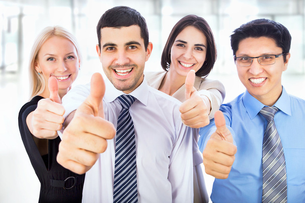 Business people showing thumbs up sign - Foto, Imagem