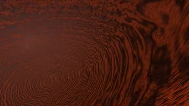 Sfondo astratto marrone ruvido che crea cerchi neri che si muovono verso l'esterno da un'area centrale di un emisfero  - Filmati, video