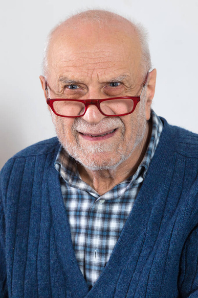 Elderly man portrait with plaid shirt. Isolated on white background - Фото, зображення