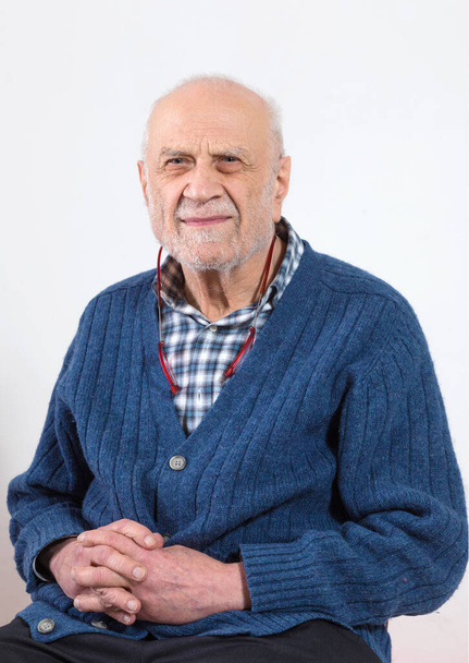 Elderly man portrait with plaid shirt. Isolated on white background - Foto, immagini