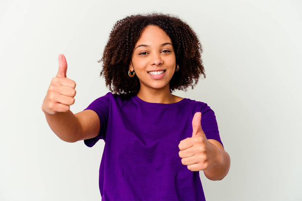 Young african american mixed race woman isolated smiling and raising thumb up - Foto, afbeelding