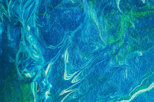 Turquoise blue abstract background in the technique of fluid art. liquid art pattern. Original art. Simulation of the depth of the ocean and the sea surface. Modern design. Drawing with acrylic paints - 写真・画像
