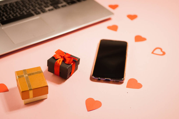 Flat lay laptop with gift boxes. Online shopping. Valentines day - Photo, Image