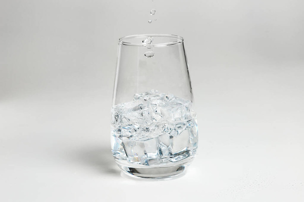 Glass of mineral carbonated water with ice - Fotografie, Obrázek