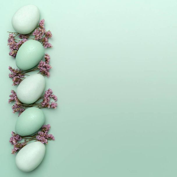Creative flat lay photo of easter eggs on colorful background - Valokuva, kuva