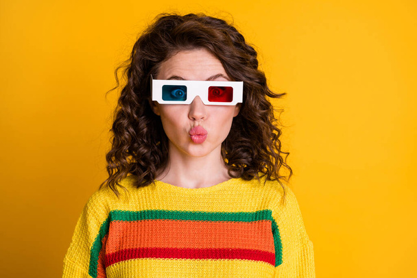 Portrait of pretty sweet young brunette hair woman blow kiss wear 3d spectacles pullover isolated on yellow color background - 写真・画像