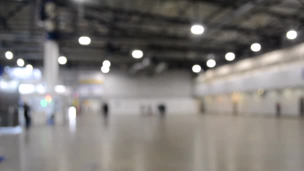 Blurred background. Inside big empty building with high ceiling. - Footage, Video