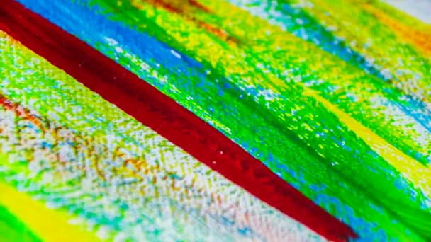 Background from different strokes of red, yellow, green and blue paint - Footage, Video