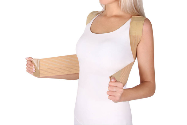 Orthopedic lumbar corset on the human body. Back brace, waist support belt for back. Posture Corrector For Back Clavicle Spine. Post-operative Hernia Pregnant and Postnatal Lumbar brace after surgery. - Foto, Imagem