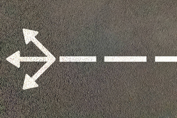 Three way road arrow for choosing direction of path , diffrent options and confusion in choise of best way concept. - Photo, Image