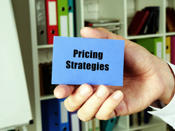 Business concept about Pricing Strategies with inscription on the blue business card - Zdjęcie, obraz