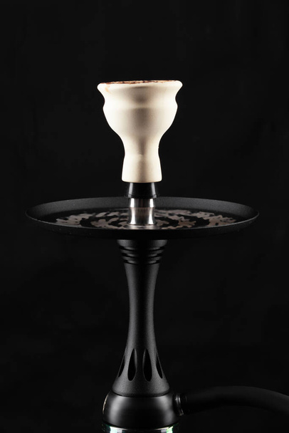 Ceramic tobacco bowl of hookah on black background - Foto, Imagem