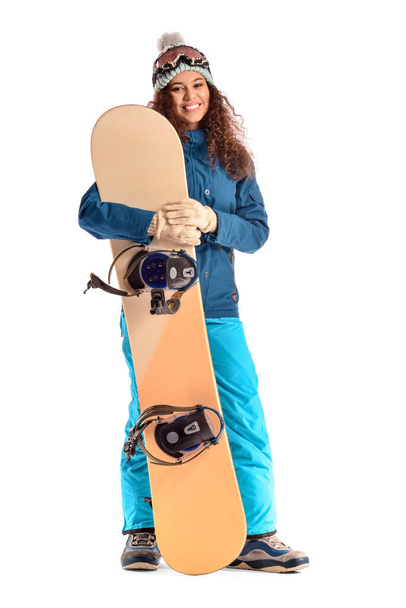 Female snowboarder on white background - Photo, Image