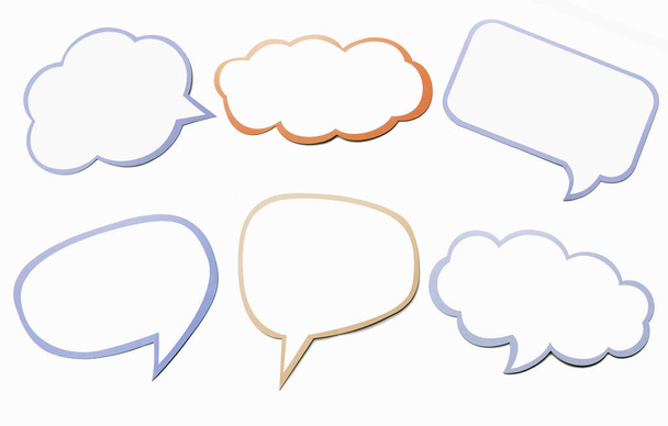 Colorful set of different speech bubble as a cloud isolated on white background. Empty blue and orange massage symbol for chat with copy space. - Photo, Image