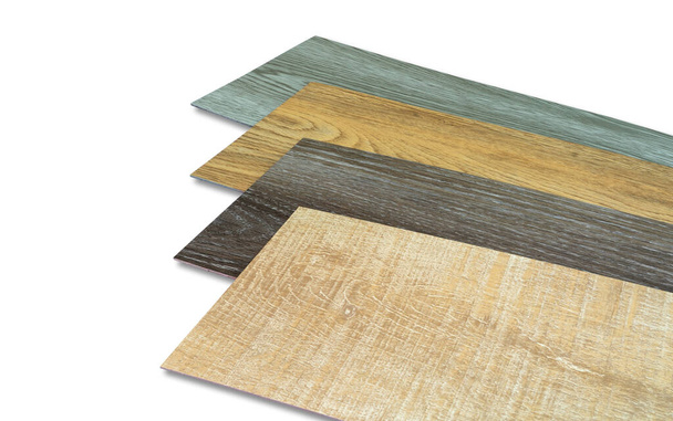 Vinyl tiles stack sample collection for interior designer. New wooden pattern vinyl tile. Vinyl flooring material isolated on white background. Polymer vinyl sheet set for new home floor. PVC material - Photo, Image