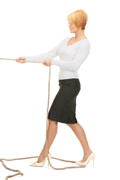 Business woman pulling rope - Φωτογραφία, εικόνα