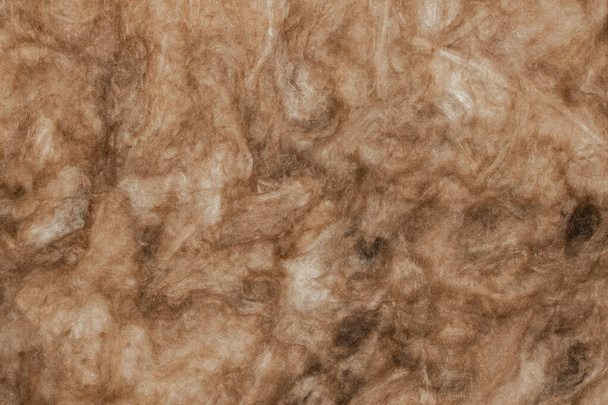 ορυκτό μαλλί για την κάλυψη τοίχων ως φόντο close-up - Φωτογραφία, εικόνα