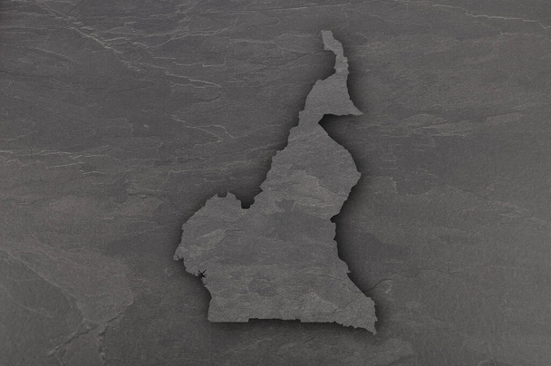 Карта Камеруна на тёмном листе - Фото, изображение