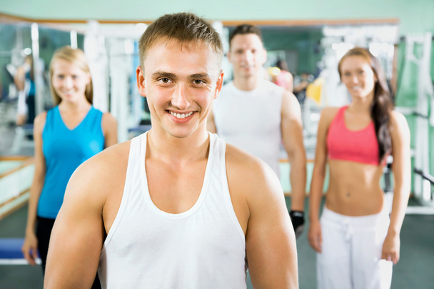Fitness instructor with gym people - 写真・画像