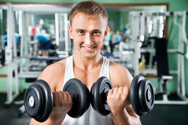 Man with weight training equipment - Foto, immagini