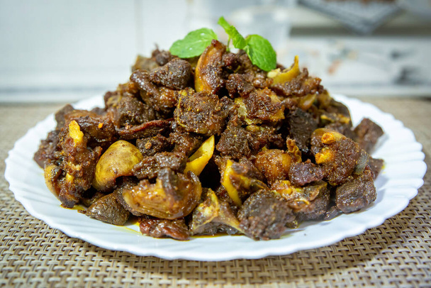 Delicioso estilo nepalí indio Mutton Fry, carne de freír seca, Dashain Special Mutton Fry Recipe.Selective focus photo. - Foto, imagen