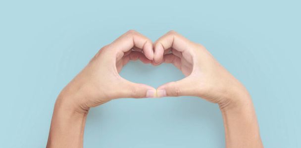 Hands making sign Heart isolated. Beautiful hands  with copy space. Love concept on Valentine day - Foto, imagen