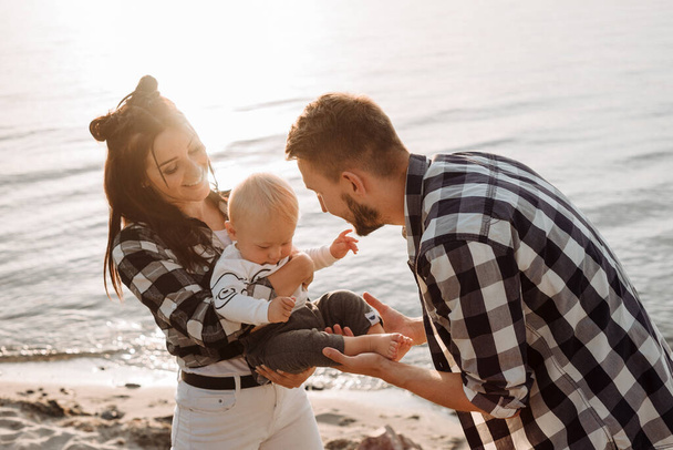 Happy young family together. Parents and their little child. - Photo, Image