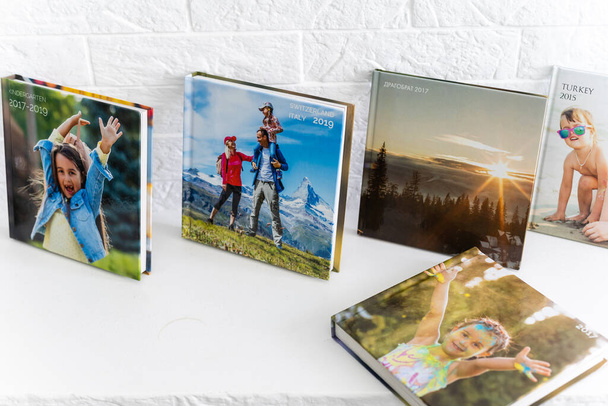 the photo album is decorated in a beautiful photobook. Presented on a white background - Фото, изображение
