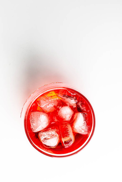 Red Strawberry Martini alcoholic drink cocktail on the bar table - Φωτογραφία, εικόνα