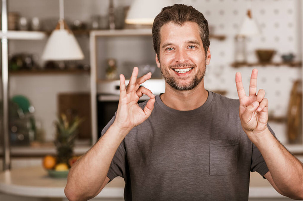 Young man showing gesture in sign language - Photo, Image