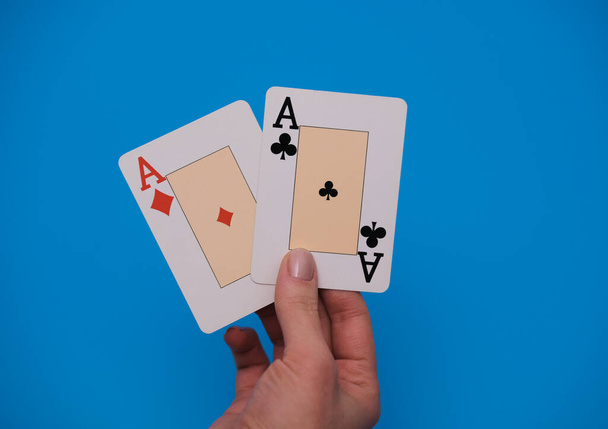 Hand holding two aces. Playing cards concept. Copy space - Foto, Imagem