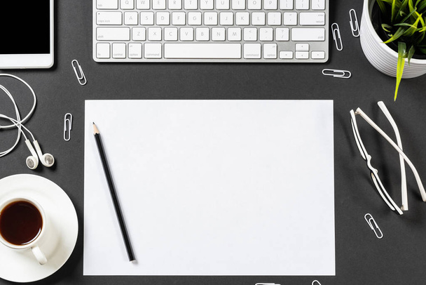 Top view of modern workplace with blank paper - Foto, Imagem