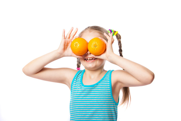 girl with oranges  - Foto, Imagen