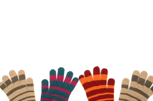 Pairs of striped gloves. - 写真・画像