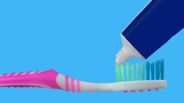 Animation De Dentifrice Serrée D'un Tube Sur Une Brosse à Dents Rose, Avec Espace De Copie - Séquence, vidéo
