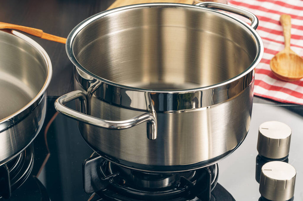 Clean saucepan on a gas stove in kitchen - Fotoğraf, Görsel