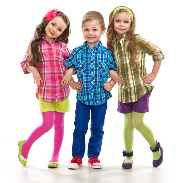 Cute fashion kids are standing together - Photo, Image