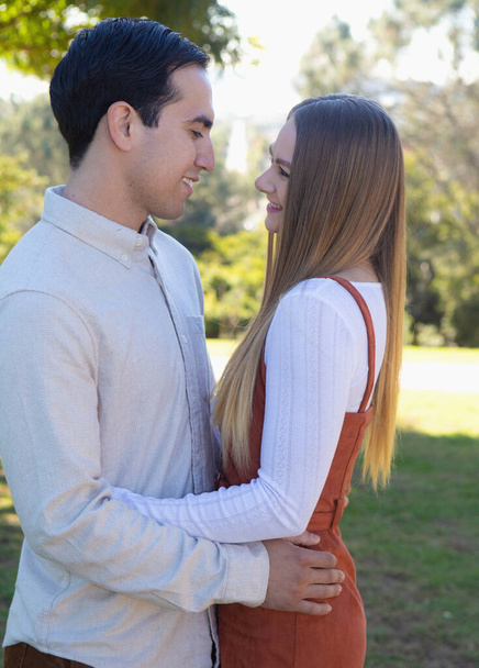 young couple outdoors at a park - Photo, Image