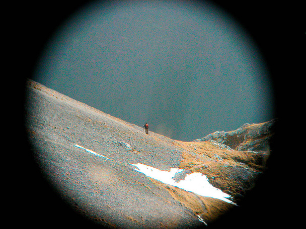 observation with binoculars in the nature, view through round binoculars - Photo, Image
