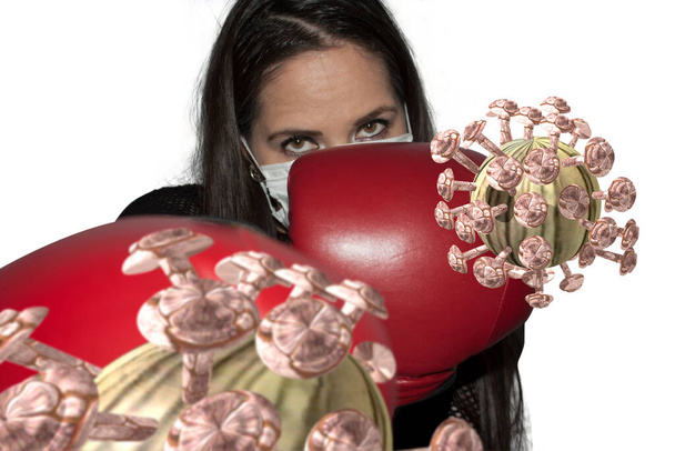 Woman boxing with mask and boxing gloves against three-dimensional covid 19 - Photo, Image