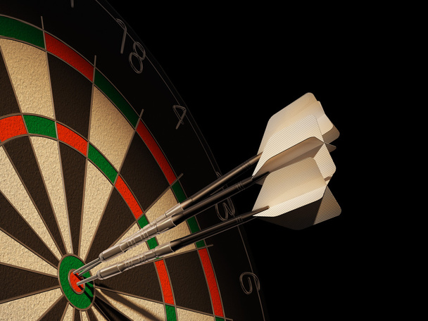 Dartboard with three darts in center target. - Photo, Image