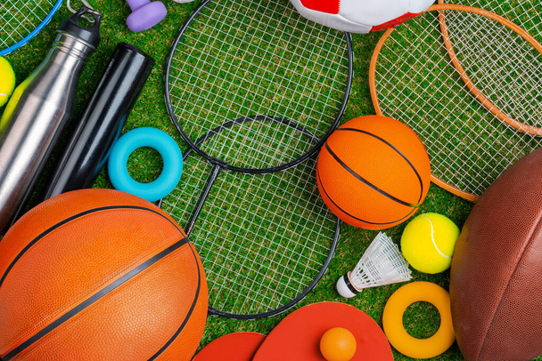 Composition of various sport equipment for fitness and games - Photo, Image
