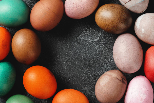 Easter eggs on a dark background - Фото, зображення