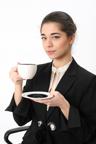 business woman with a cup of coffee - Zdjęcie, obraz