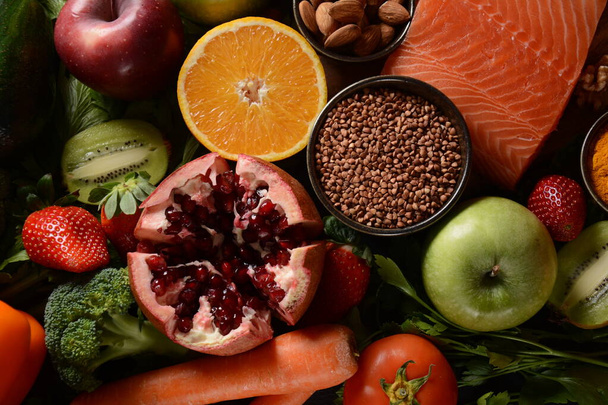 Healthy food background fruits vegetables, salmon, honey, seeds, superfood, cereals, - Фото, зображення