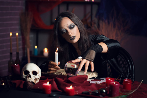 Witch performing black magic ritual - Photo, Image