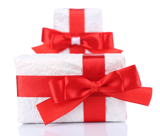 Beautiful gifts with red ribbons, isolated on white - Zdjęcie, obraz