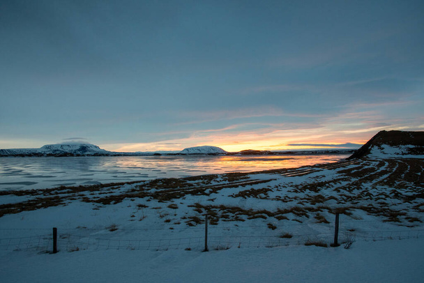 The sunrise above lake Myvatn in North Iceland - Photo, Image