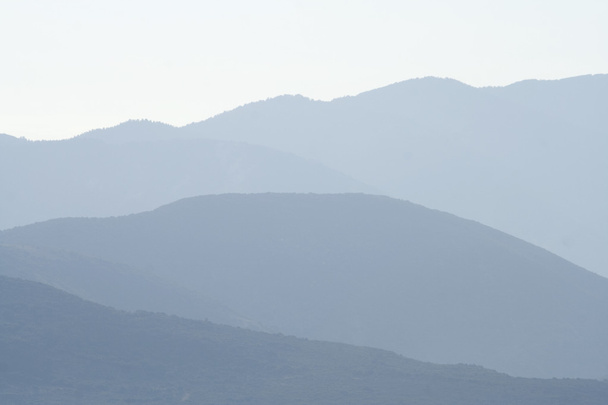 Distant hills - misty background - Photo, image